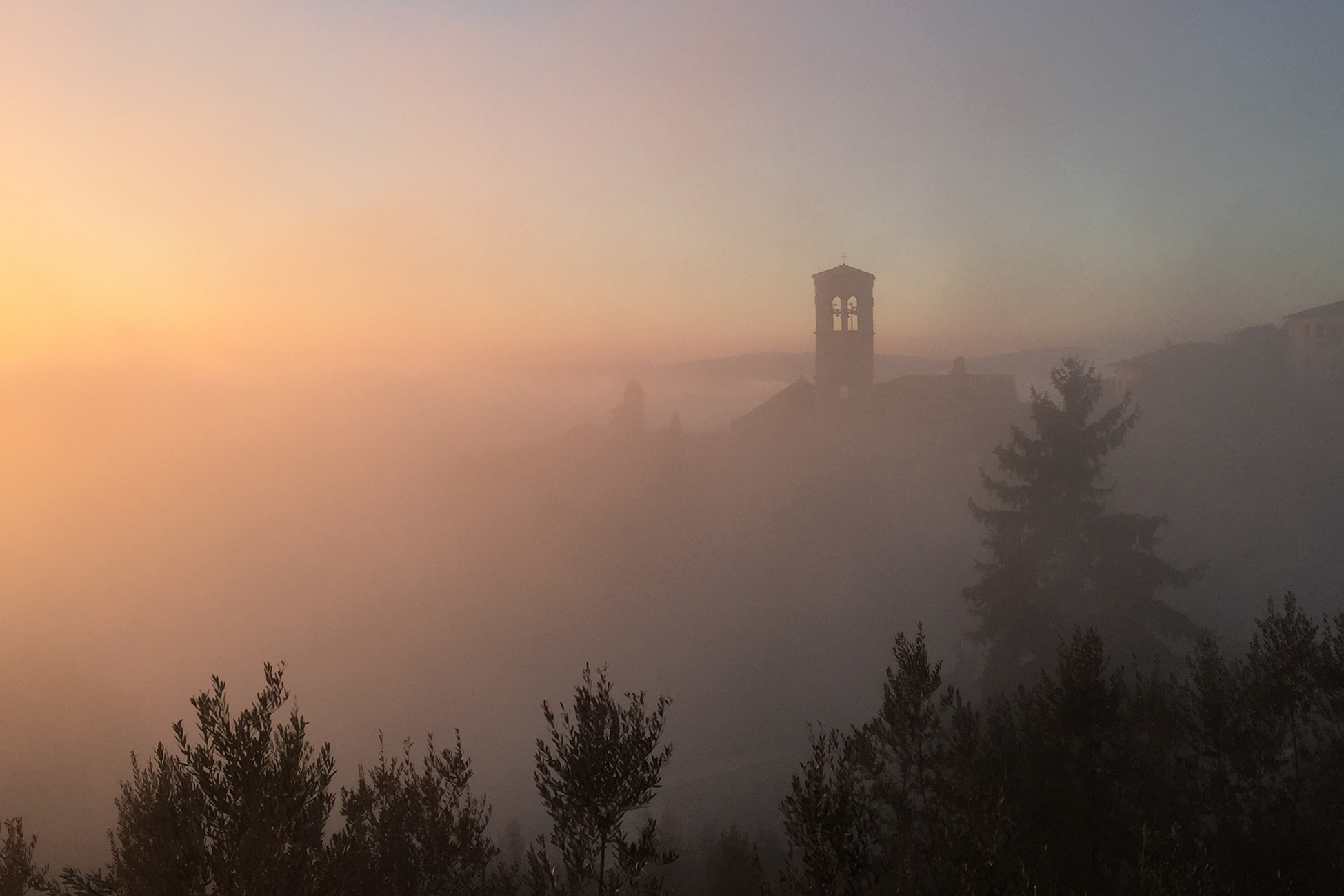 Assisi with fog and sun
